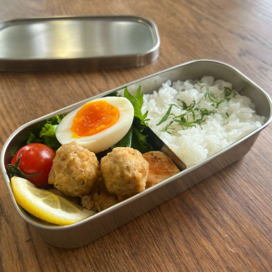 お弁当に詰めたチキンナカタのつくね
